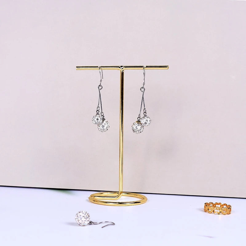 présentoir bijoux métal doré velours blanc rangement boucles oreilles colliers exposants boutique bijouterie professionnel