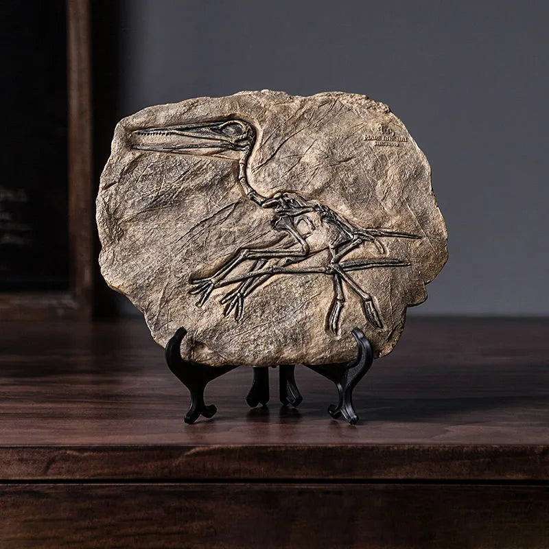 squelette dinosaure résine décor maison salle gris marron clair os roche tringle noire réaliste