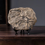 squelette dinosaure résine décor maison salle gris marron clair os roche tringle noire réaliste