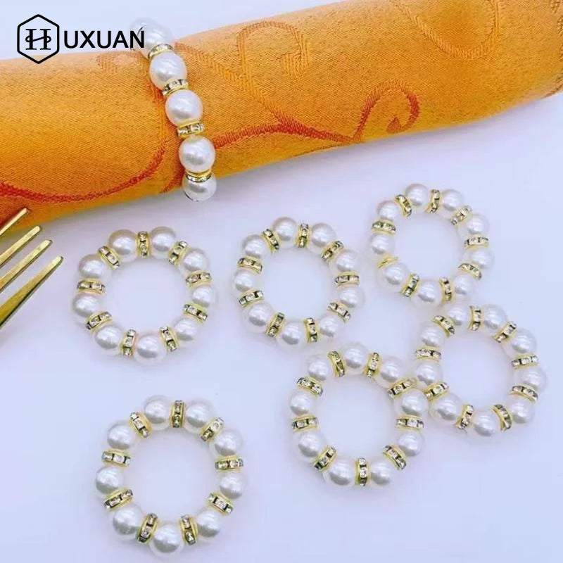 anneau serviette strass dorés classique élégant blanc or événements table luxueux fixations