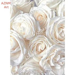 tableaux moderne floral brillants fleurs rose pâle blanc beige salon chambre décoration maison