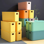 boîtes rangement plastique blanc orange rose vert bleu jaune moderne poignées couvercle