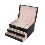 boîte bijoux simili cuir verte moderne poignées dorées tissu beige intérieur 23x17x13.5cm