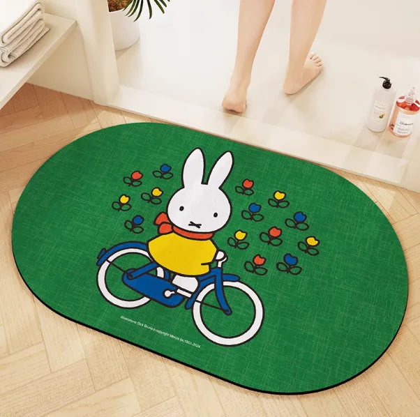 tapis bain dessin animé lapins gris jaune vert bleu rayures enfantin absorbant