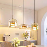 suspension lumineuse moderne transparente dorée câble noir alliage led dimmable certification rohs flux luminescent