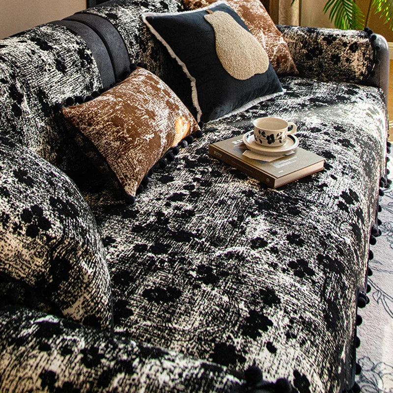 housse canapé moderne blanche taches noires pompons décoratifs protection salon tissu polyester élégant