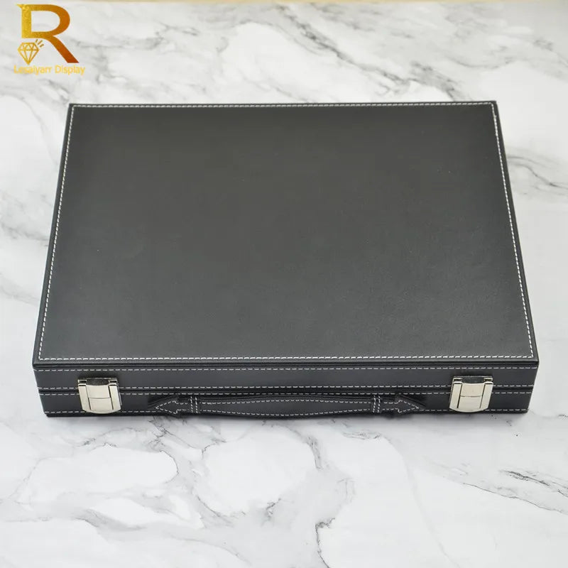 boîte bijoux simili cuir noir 60 compartiments clips velours intérieur classique