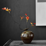 vase moderne noir texture grunge opacité fleurs artificielles salon table vintage rustique