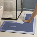 tapis antidérapant moderne minimaliste motif pieds salle bain bleu foncé gris blanc absorbant