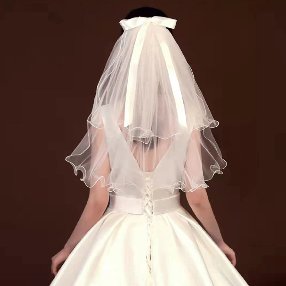 voile mariée tulle plissé blanc classique romantique fixé noeud transparent élégant