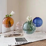 vases sphériques transparents moderne vert rose orange bleu fleurs artificielles hydroponique ecologique