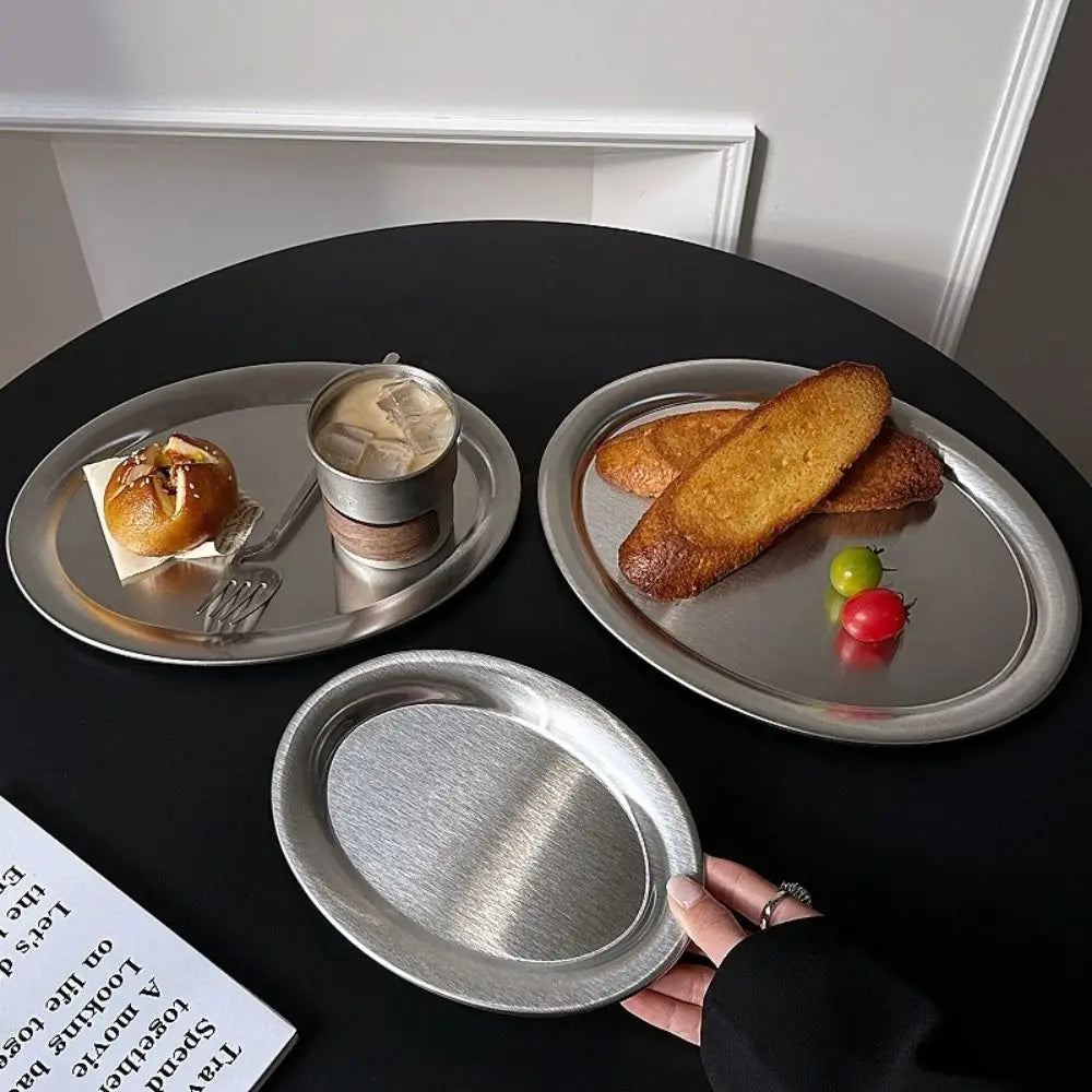 assiette ovale argentée moderne minimaliste lisse brossée rangement bijoux dîner