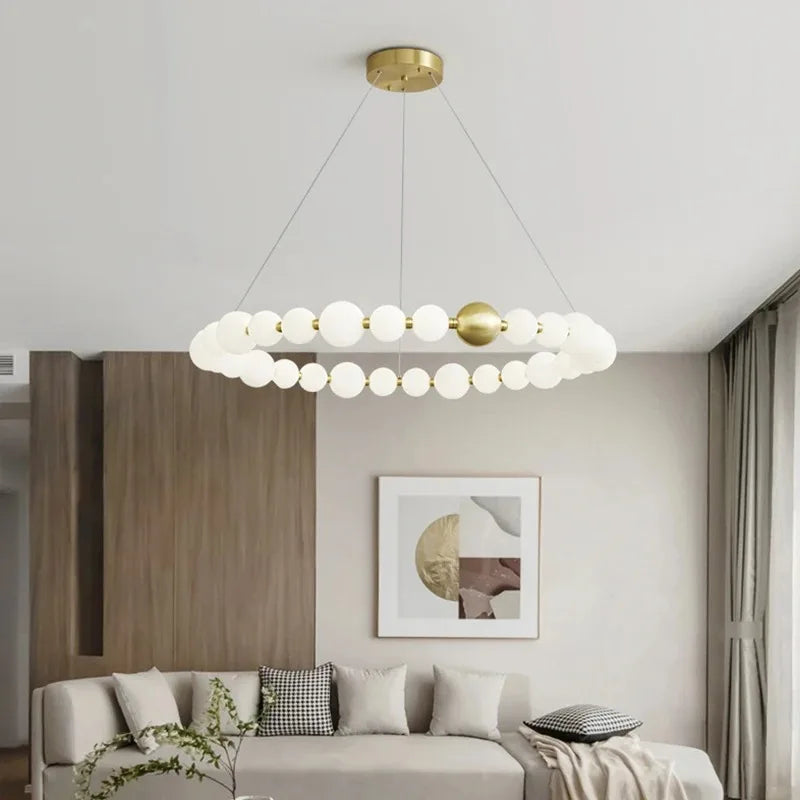 suspension lumineuse moderne blanc doré boules rondes salon chambre restaurant étude