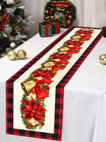 Élégante nappe de table de Noël ornée de poinsettias rouges, de cloches dorées et d'un motif écossais festif.