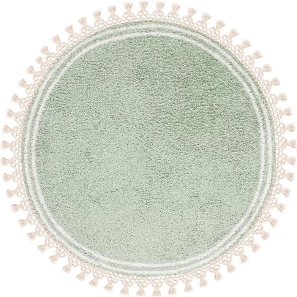 tapis rond moderne vert clair texture douce franges blanches salon chambre bébé