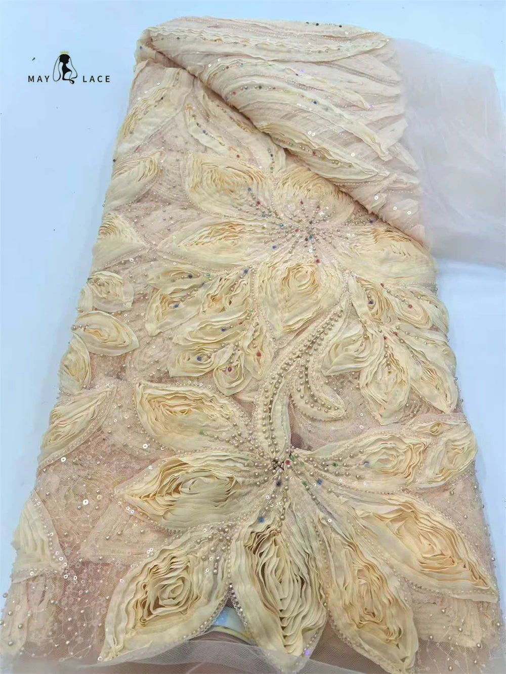 dentelle africaine brodée fleurs sequins bleu blanc vert orange translucide mariage