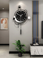 Horloge murale nordique moderne en métal noir pour salon, pendule silencieuse