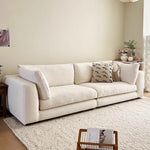 canapé moderne blanc texture douce pieds noirs oreillers minimaliste bois salon 180cm 78cm assemblage