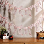 guirlande décorative festives rose noeuds tissu texturé semi transparent mariage anniversaire fille préparation naissance