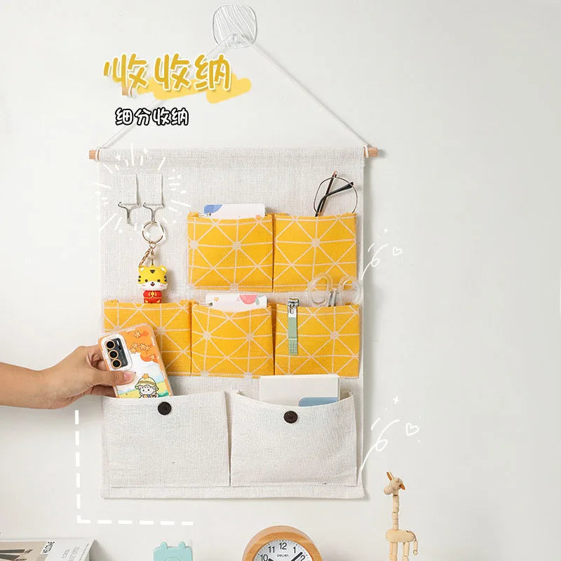 sac rangement mural multiple poches clips magnétiques beige jaune organisation moderne poches utilitaires porte