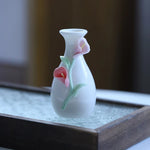 vases céramique artisanal poissons fleurs blanc bleu rouge vert