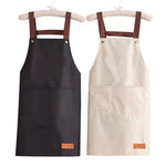 tablier cuisine imperméable bleu clair beige noir nettoyage poche avant épaulières cuir classique