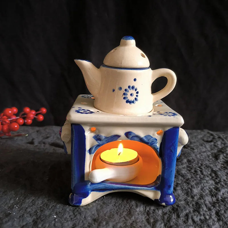 diffuseur huiles essentielles céramique blanc bleu fleurs stylisées rustique théière chauffe thé salon decoration