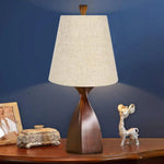 lampe table moderne beige texture lin opale fixations ruban bleu doré decoration intérieure