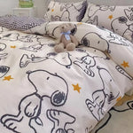 ensemble literie snoopy motif carreaux blanc noir jaune étoiles enfantin moderne 4pièces