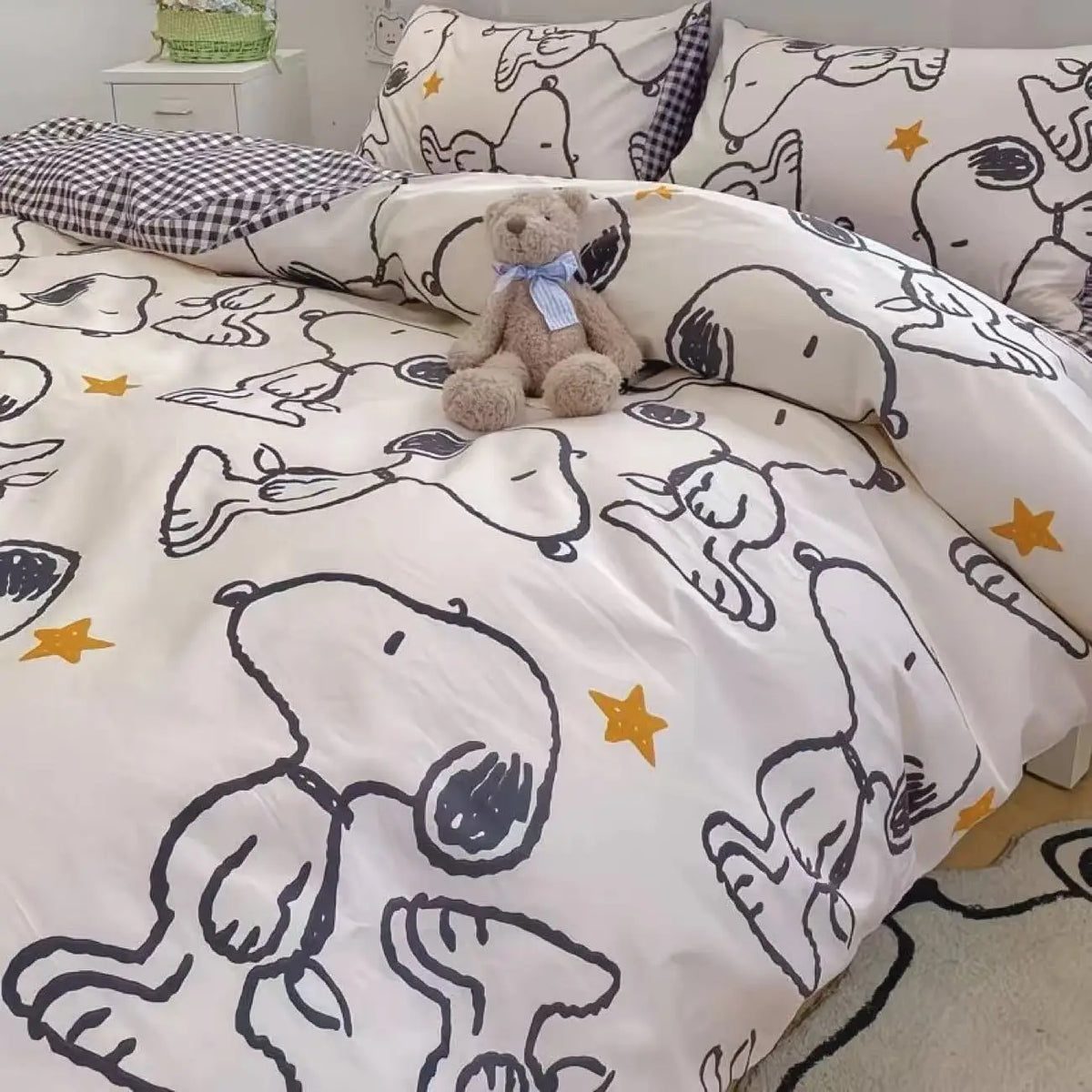 ensemble literie snoopy motif carreaux blanc noir jaune étoiles enfantin moderne 4pièces