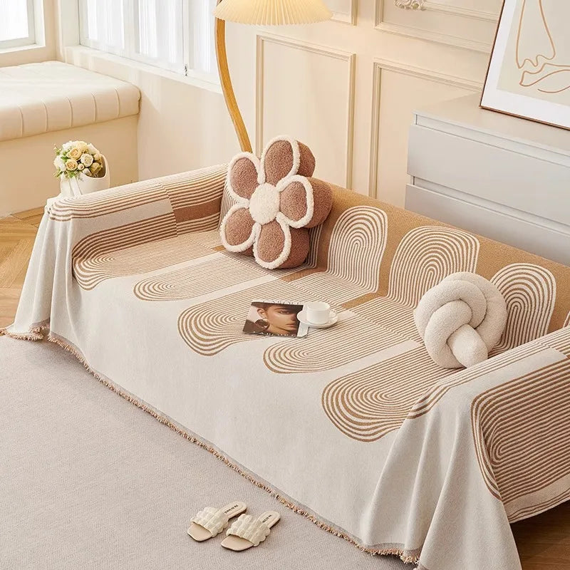 couverture canapé moderne rayures horizontales franges beige crème gris clair salon intérieur