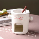 bouilloire chocolat céramique moderne cuillère bois bougie rouge noir blanc