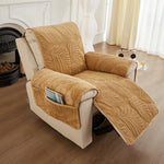 Un fauteuil reclinable confortable avec un motif de feuilles en relief, des rangements et des accessoires pratiques.