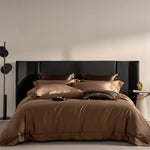 Parure de lit marron avec taies d'oreiller et drap plat