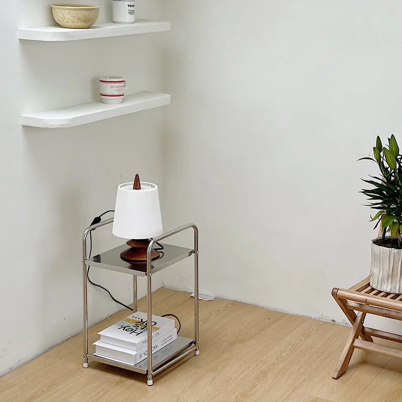 table d'appoint moderne minimaliste argentée plateau transparent structure métallique inoxydable hauteur 49cm largeur 28cm
