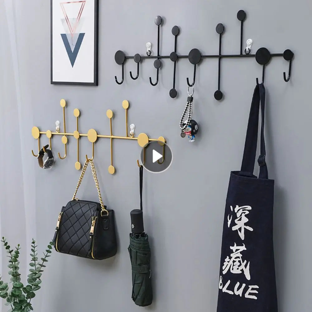 Porte-manteau mural design noir sans trace pour entrée moderne