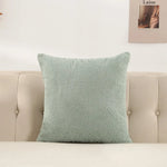coussin peluche vert jaune rose gris clair texture bouclée moderne 60x60cm fixations