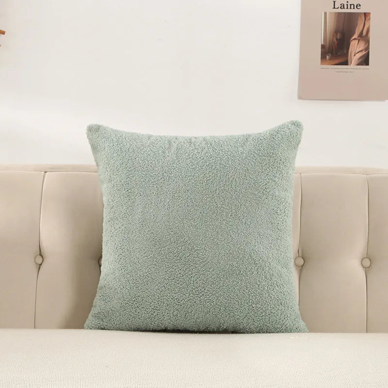 coussin peluche vert jaune rose gris clair texture bouclée moderne 60x60cm fixations