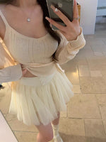 jupe élastique minijupe dessus genou élégante tulle noir blanc féminine chic translucide boutons