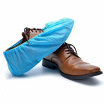 protège chaussures jetables non tissés bleu clair élastiques 100 pièces