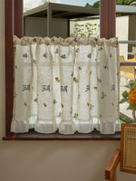 rideau fenêtre court brodé motifs floraux tissu texturé franges semi transparent rustique cuisine chambre