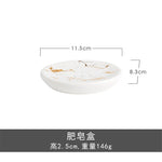ensemble salle bain moderne blanc doré marbre veines élégant pompe tasse dents support savon
