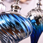 vase verre bleu tourbillon moderne décoration intérieure élégante transparent ornement floral