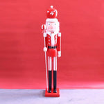 figurine soldat noel rouge blanche bleue dorée verte uniforme militaire couronne dorée moustache ruban