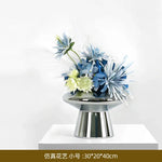 vase moderne argenté brillant fleurs artificielles blanches vertes décoration maison
