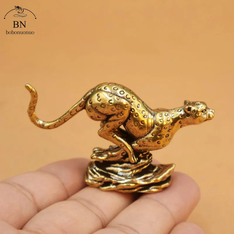 statuette léopard doré taches marron clair base vague artisanat décoration maison traditionnelle asiatique