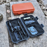 boîte rangement pratique robuste noire orange beige motifs géométriques contenant trousse secours lampe couteau
