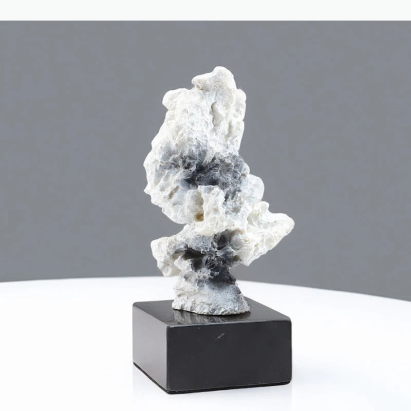 sculpture moderne décoration blanc noir gris rocheuse irrégulière zen livres diffuseur parfum bougie