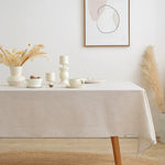 nappe réutilisable polyester texture lin beige table fête scandinave minimaliste rustique assiettes chaises