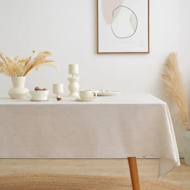 nappe réutilisable polyester texture lin beige table fête scandinave minimaliste rustique assiettes chaises